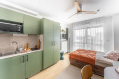 Kitchenette équipée et coin nuit lumineux