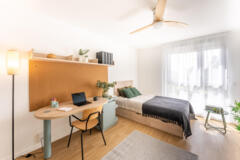 Studio spacieux, bureau et coin nuit