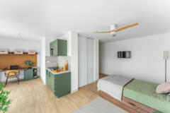 Grand studio avec bureau, kitchenette et coin nuit