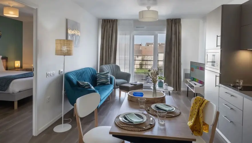 Salon d'un appartement T2 de la résidence senior Domitys à Herblay-sur-Seine - Domitys Les Belles Lettres Herblay-sur-Seine