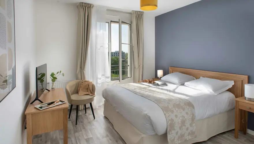 Chambre meublée d'un appartement en résidence senior Domitys - Domitys Casandra Villepinte