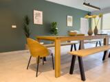 Grande table dans la cuisine partagée de l'Habitation ALLURE sur l'île de Nantes - ALLURE